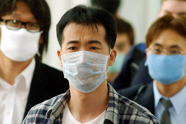 Аэропорты Японии усилили контроль в связи со вспышкой пневмонии